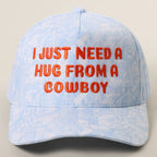 I JUST NEED A HUG FROM A COWBOY Embroidered Camo Trucker Hat