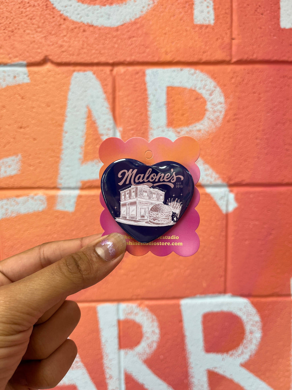 Malone’s Off Campus Button Pin