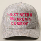 I JUST NEED A HUG FROM A COWBOY Embroidered Camo Trucker Hat