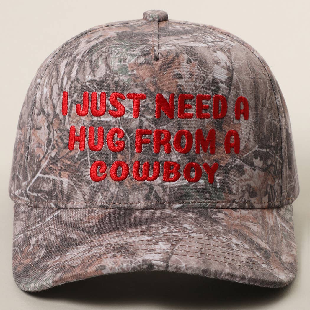 I JUST NEED A HUG FROM A COWBOY Embroidered Camo Trucker Hat