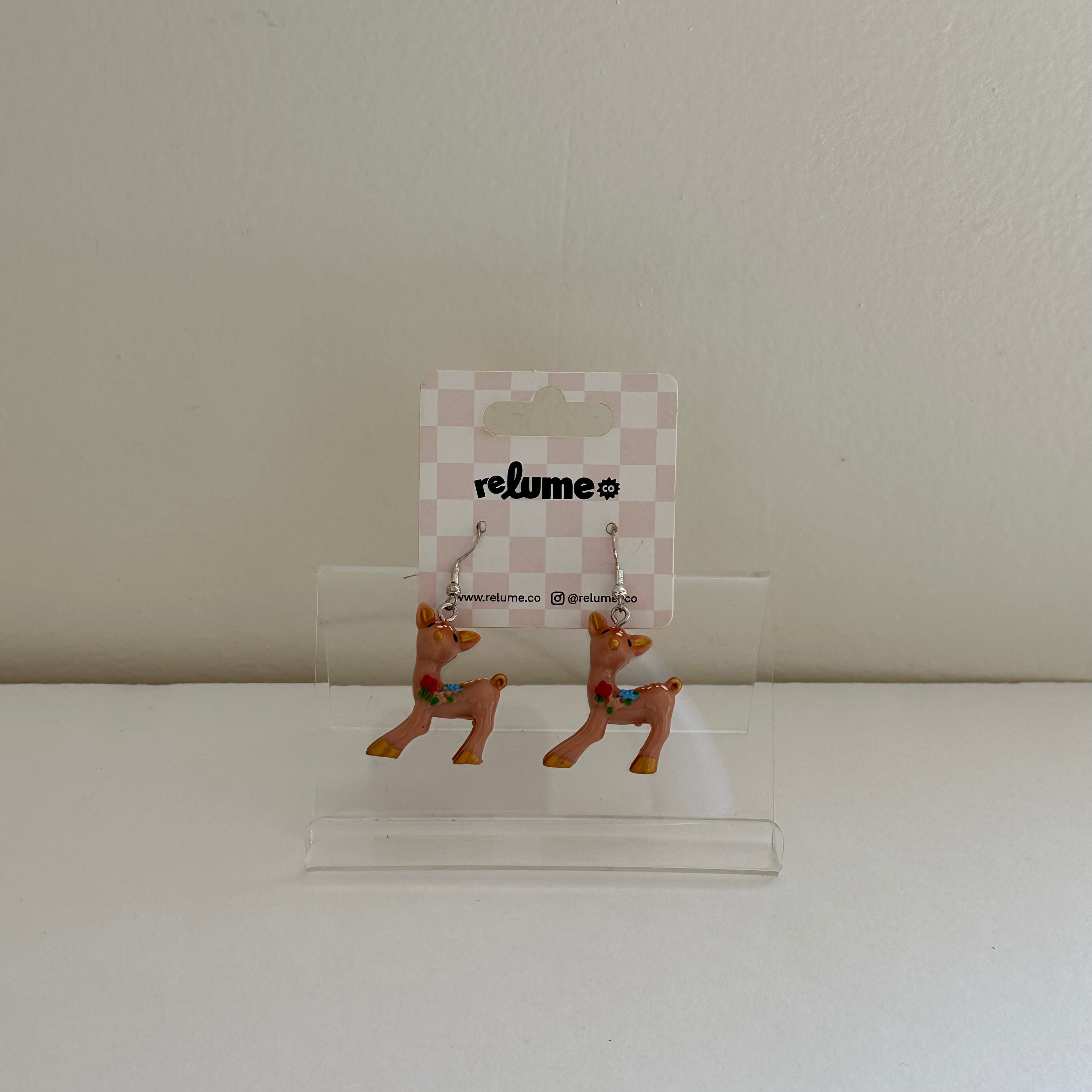 Seasonal Christmas -- plastic reindeer