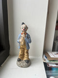 Tall Clown Figure with Saxophone