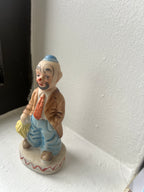 Small Clown Figure with Umbrella