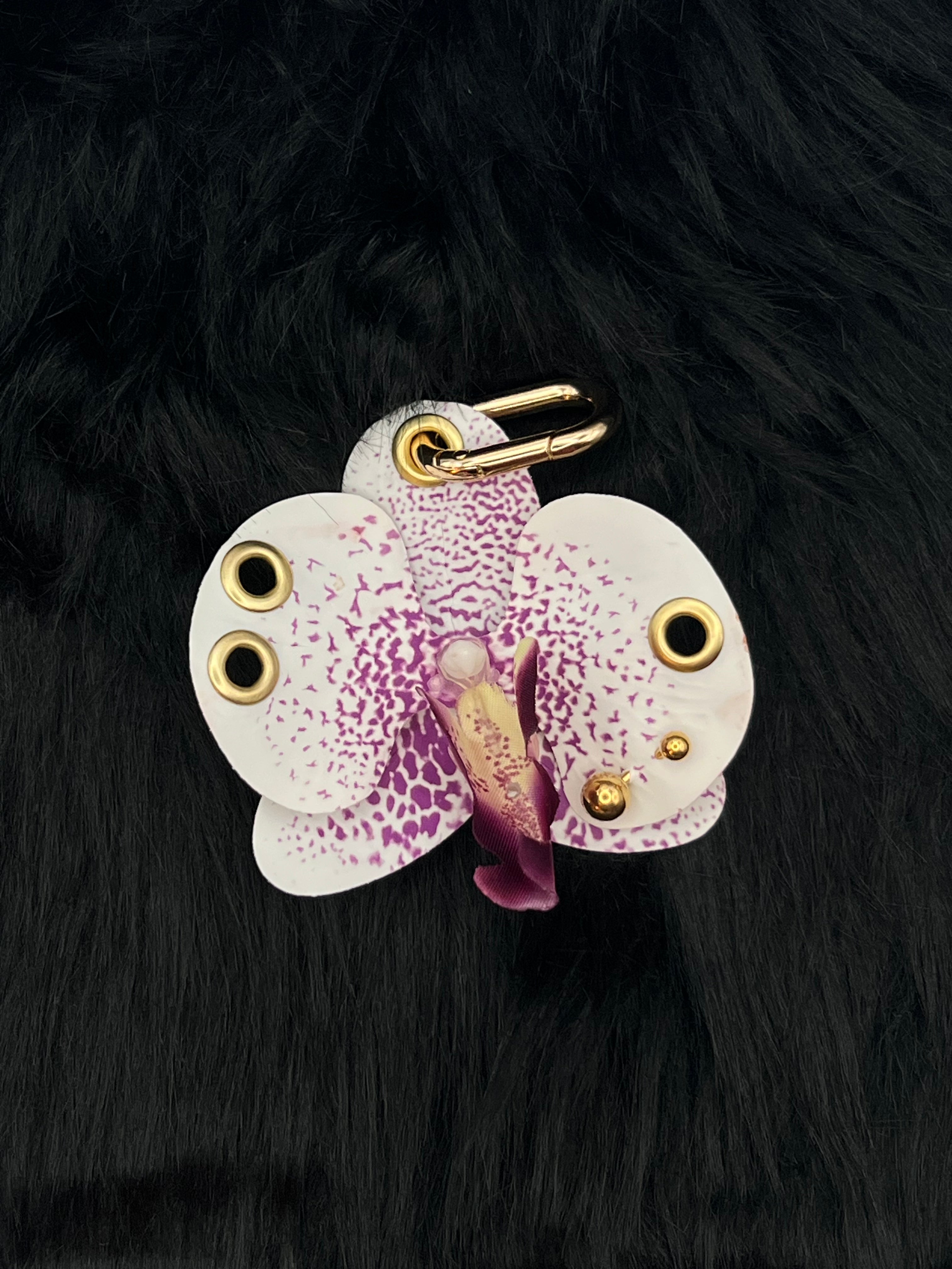 Purple and White Orchid with Gold Piercings