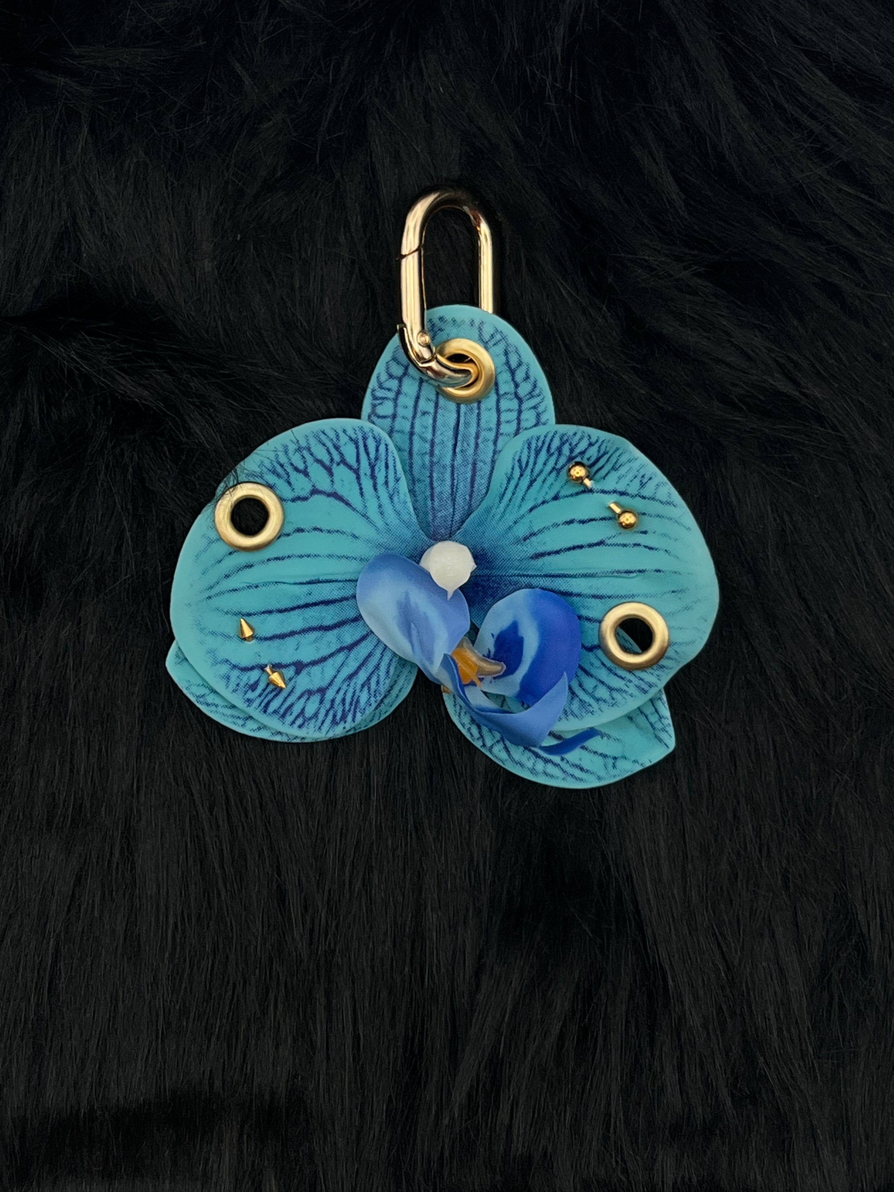 Blue Orchid with Gold Piercings