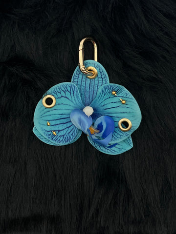 Blue Orchid with Gold Piercings