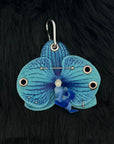 Blue Orchid with Silver Piercings