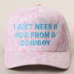 I JUST NEED A HUG FROM A COWBOY Embroidered Camo Trucker Hat