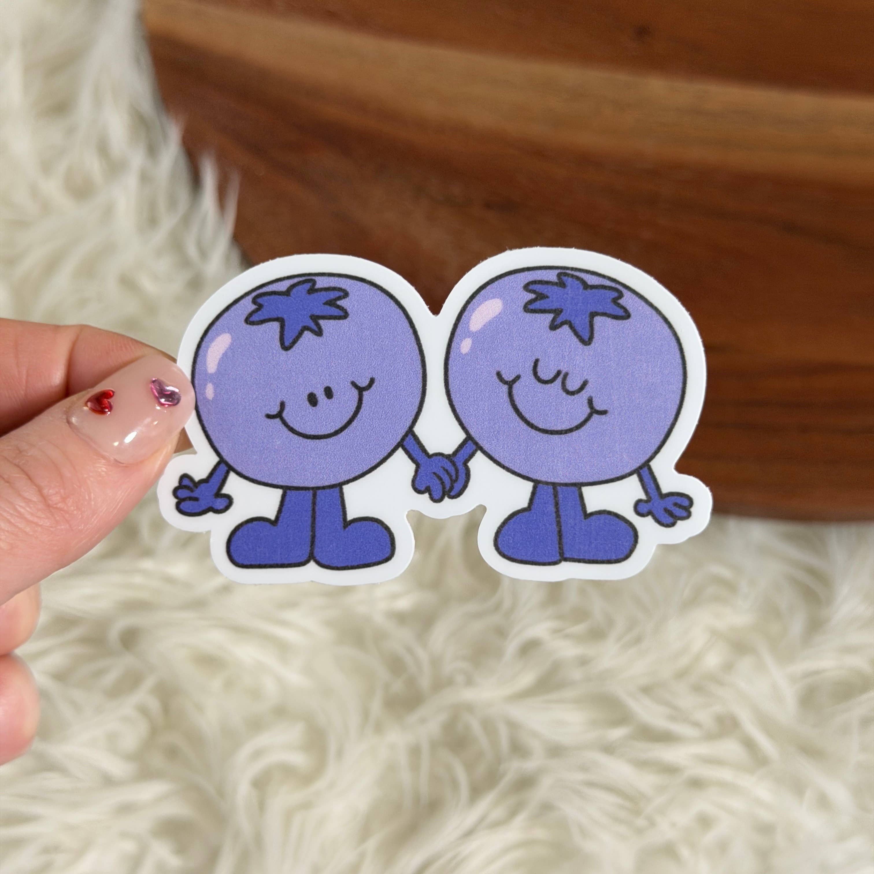 Blueberries Holding Hands Sticker