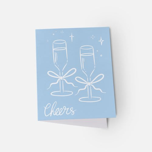Greeting card with champagne glasses and 'Cheers' text on a light blue background