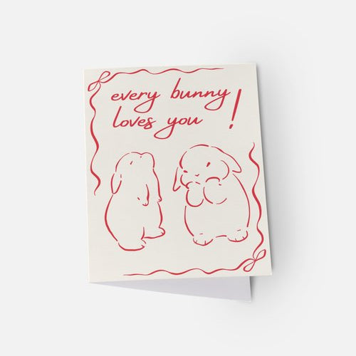 Greeting card with 'every bunny loves you' text and bunny illustrations on a white background