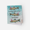 Greeting card with fish illustrations and 'o~fish-ially your birthday!' text on a watery background.